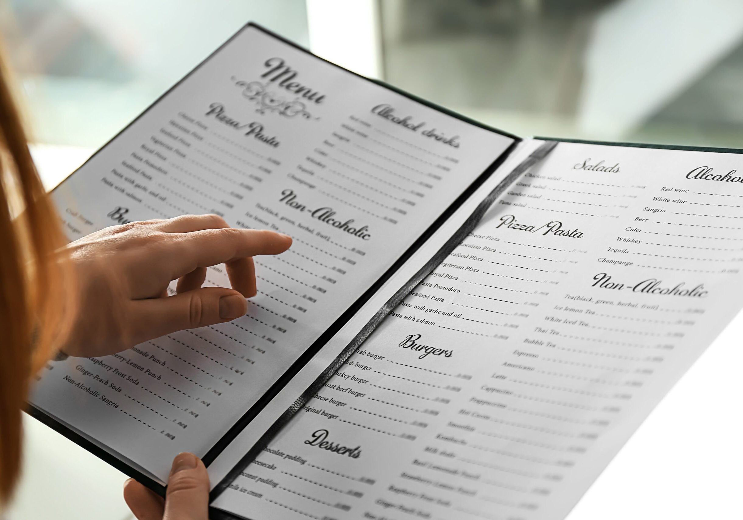 A sleek, minimalist restaurant menu layout featuring dishes that reflect trends.